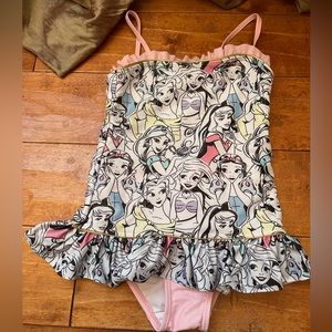 Size 5/6 Swimsuit Disney Princess themed.  Never been used.  Just washed once.